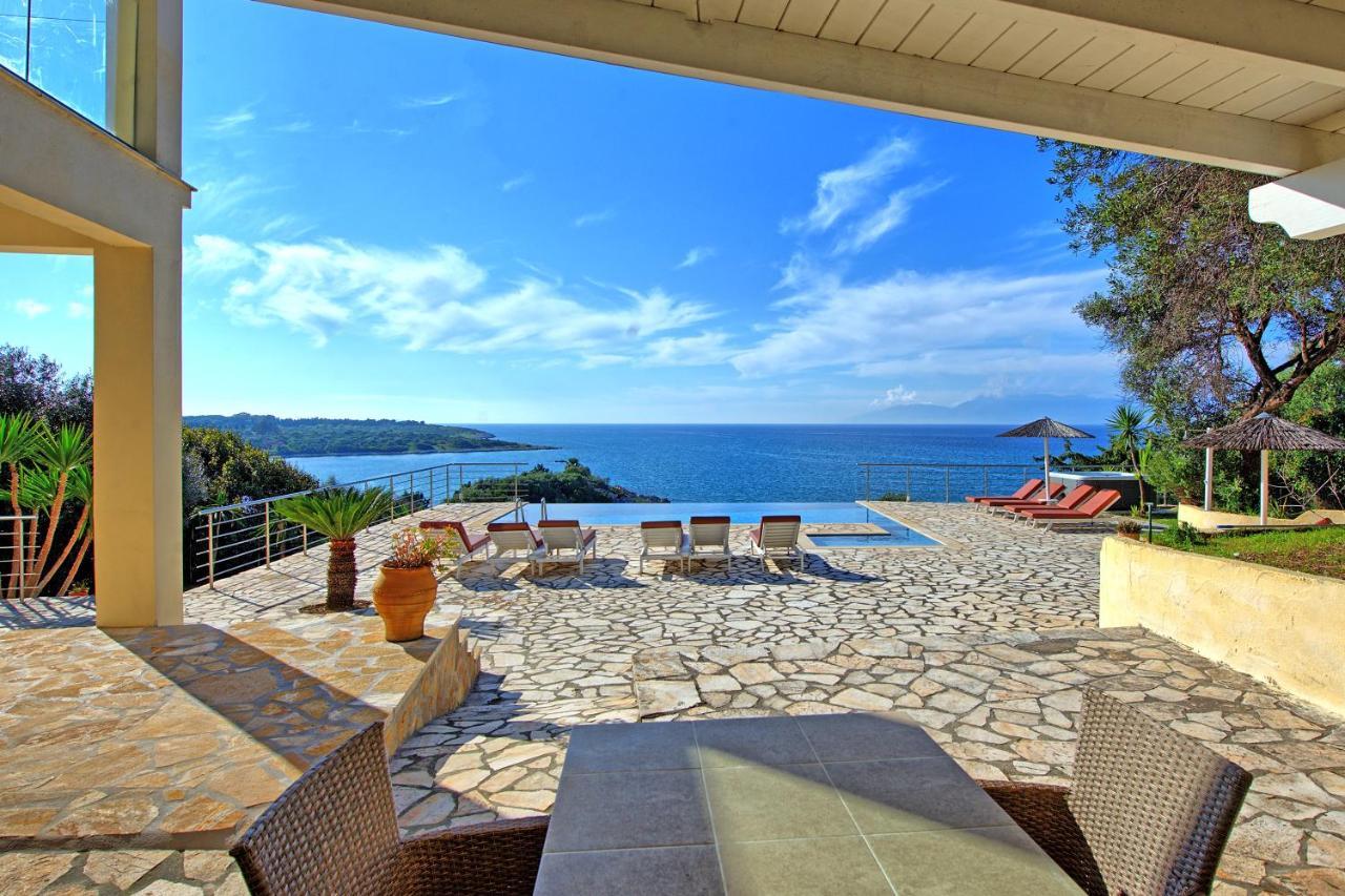 Beachfront Villa Seasun By Posarellivillas Agios Spyridon  Zewnętrze zdjęcie