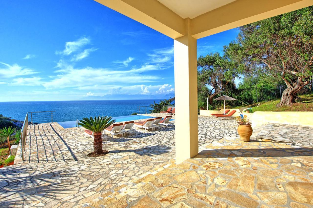 Beachfront Villa Seasun By Posarellivillas Agios Spyridon  Zewnętrze zdjęcie